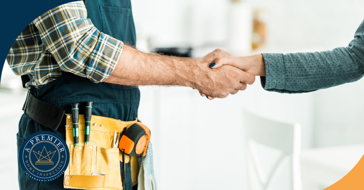 Handshake between home inspector and client, symbolizing trust and professional service.