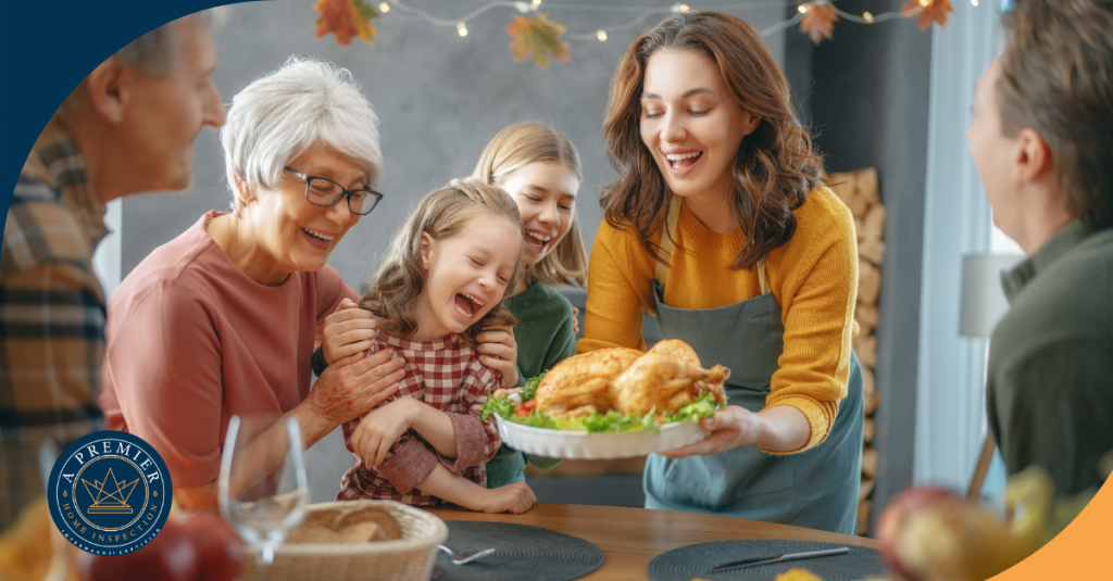 Family gathered around a table smiling as a woman presents a roasted turkey during a festive meal.